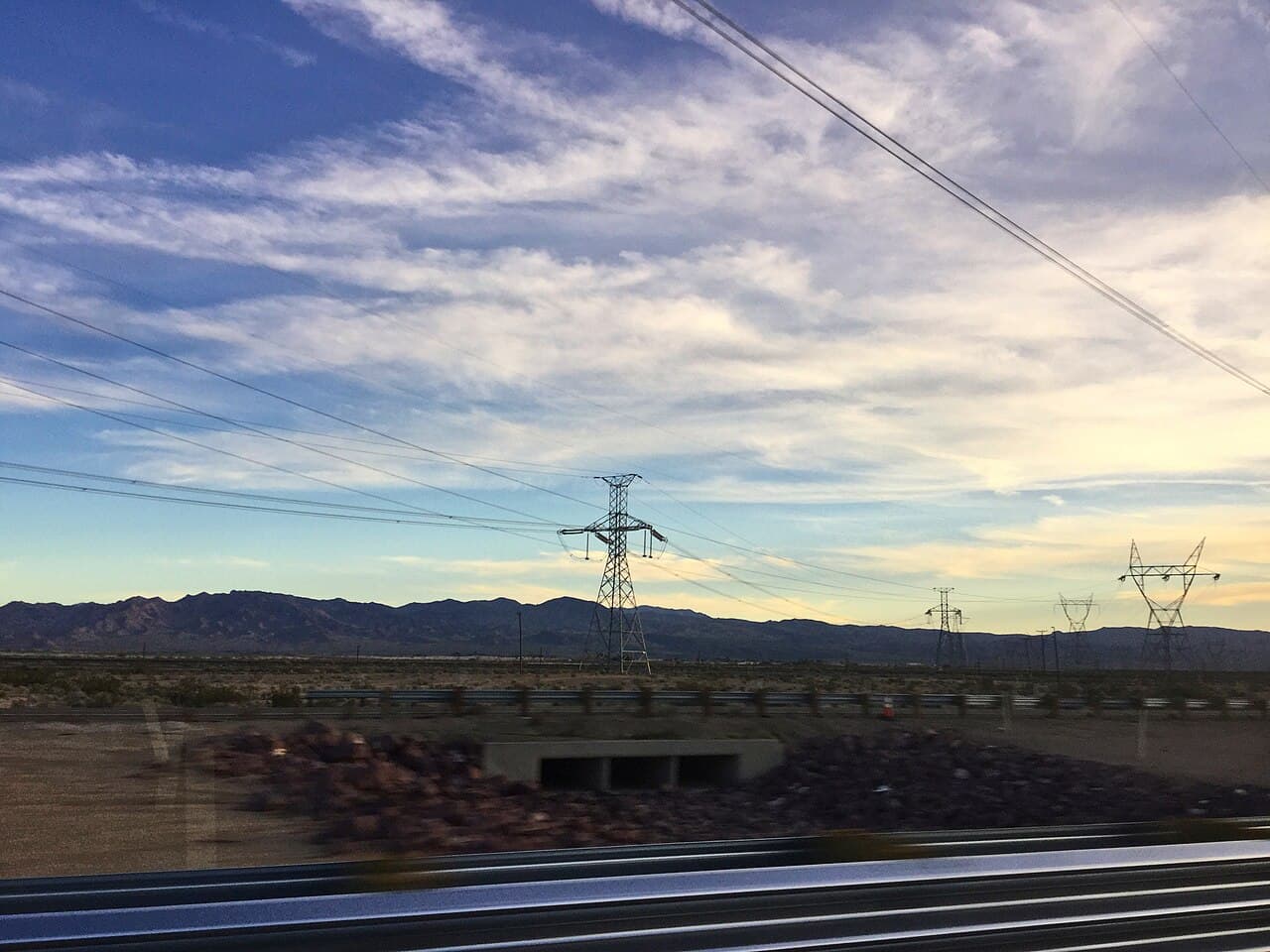 High-voltage power lines running beside Interstate 15 in California