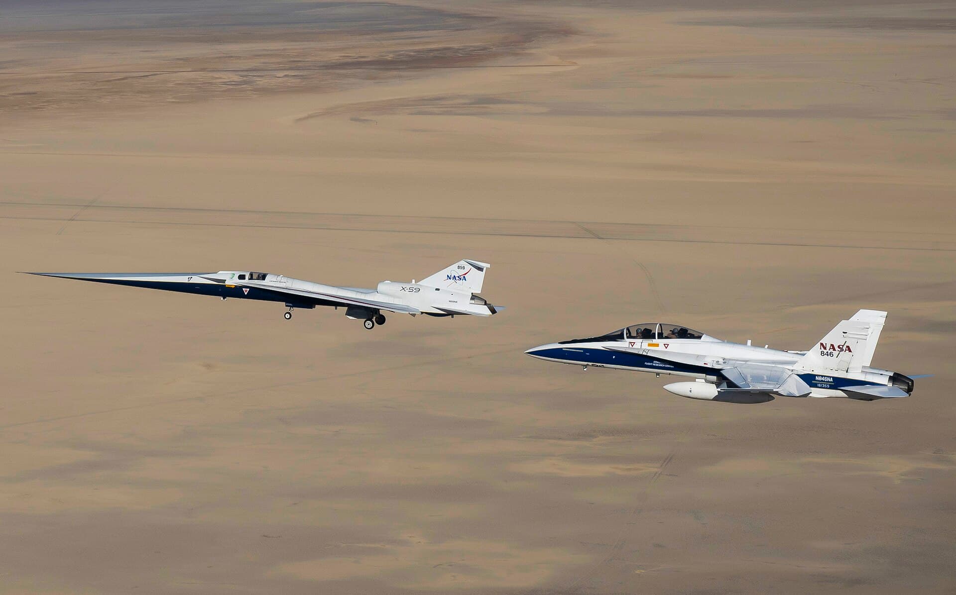 NASA’s X-59 quiet supersonic research aircraft, with a NASA F/A-18 chase plane, flies above Palmdale and Edwards during its first flight, Oct. 28, 2025 (NASA file photo)