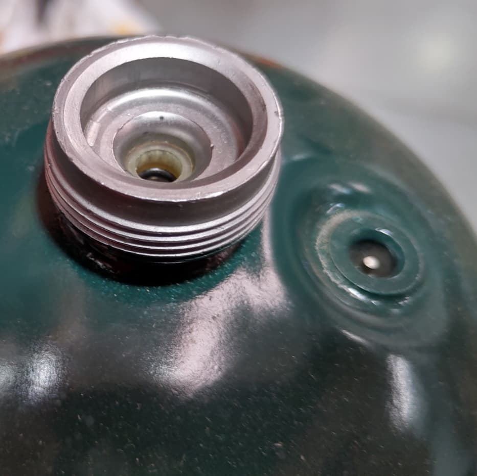 The valve on a disposable one-pound propane camping cylinder, the kind of canister California's SB 1280 would bar from most sales starting in 2028 (file photo, 2019)